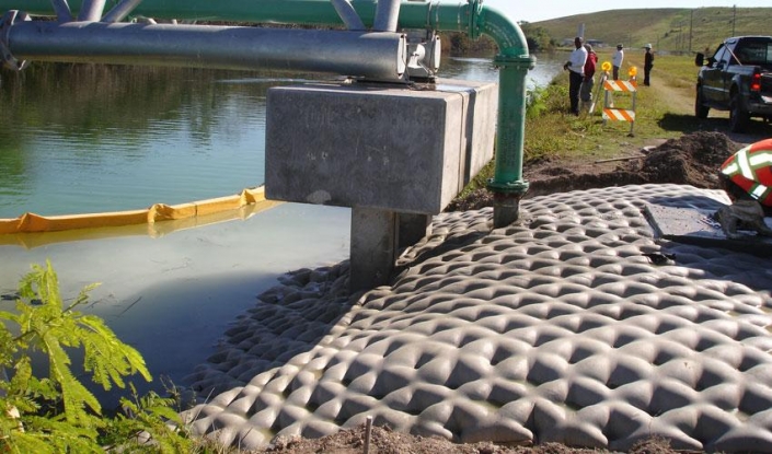 fabric formed concrete for protecting pipeline
