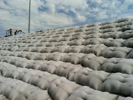 fabric formed concrete for spent fuel storage facility