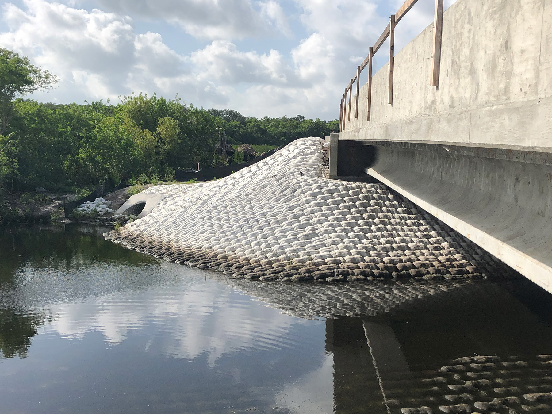 concrete fabriform around bridge for permanent erosion control