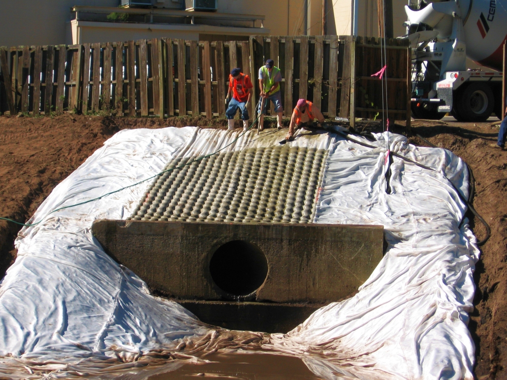 fabric formed concrete erosion protection for basin